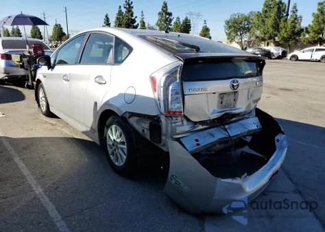2014 Toyota Prius Plug-In from USA, damaged, VIN JTDKN3DP1E3052567